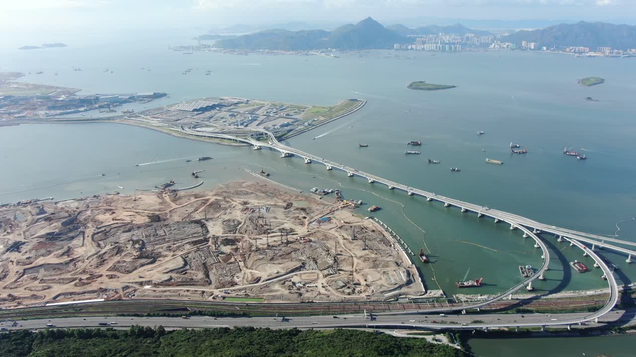 instalaciones de cruce fronterizo de hong kong y puente principal y sistema de carreteras en construcción, vista aérea