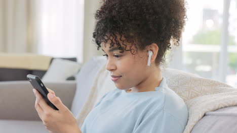 African-woman-browsing-social-media-on-her-phone