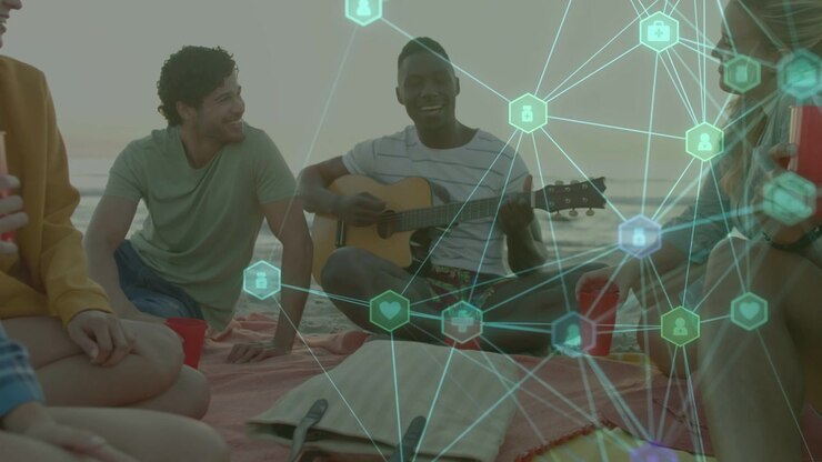Guitarist starting song on beach, entertaining group with red cups while tech overlay appearing
