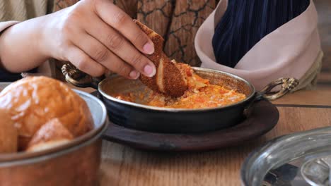 woman eating a turkish breakfast