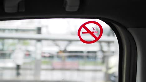 no smoking sign in a car