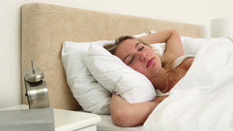 blonde moving while sleeping