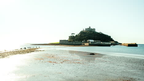 Receding-tide-at-St-Michael's-Mount,-Cornwall,-UK