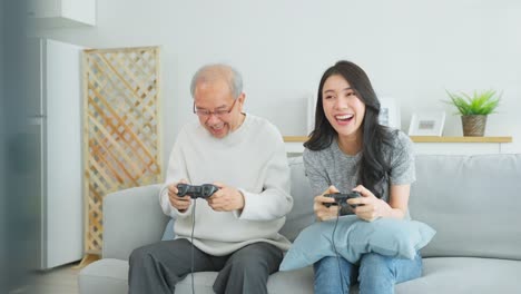 grandparent and grandchild playing video games