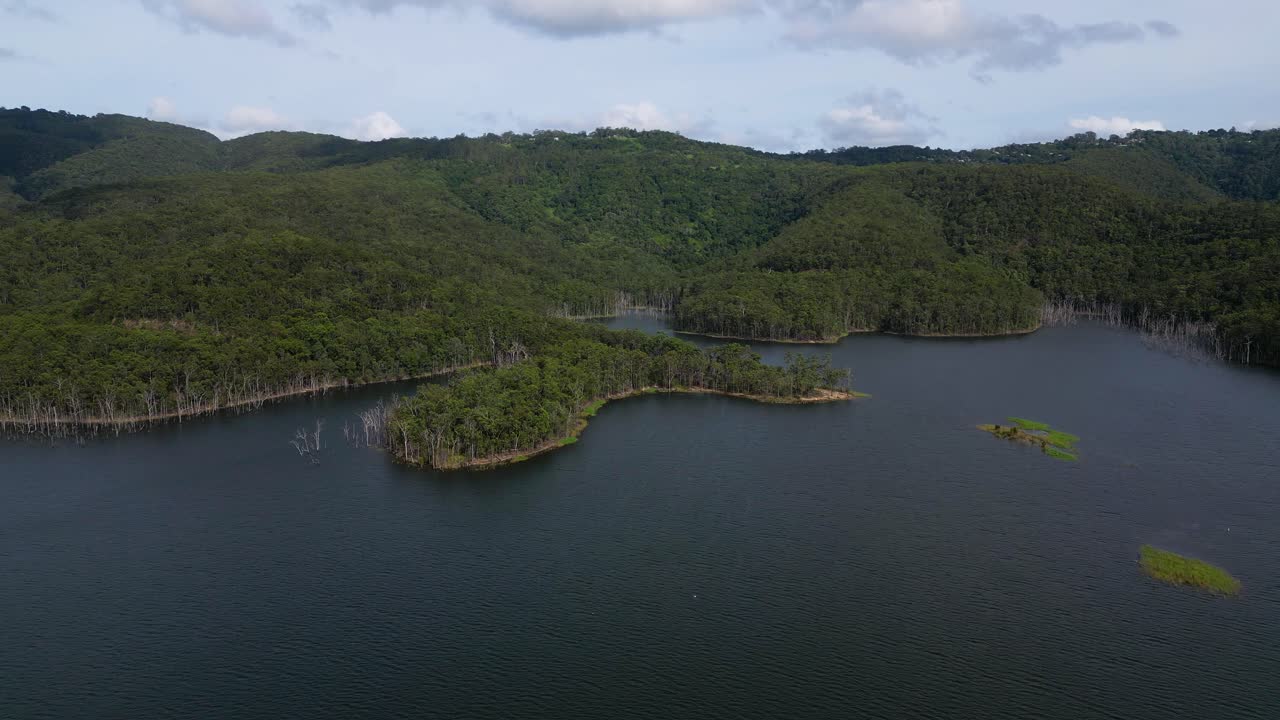 Left to right aerial views of Advancetown Lake near the Western Boat Ramp on the Gold Coast Hinterland.