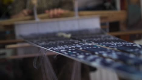 weaving silk on a loom