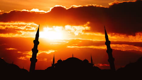 sunset over a mosque silhouette