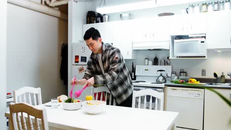 Couple-having-breakfast-at-home