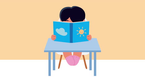 niña estudiante leyendo un libro de texto en el escritorio