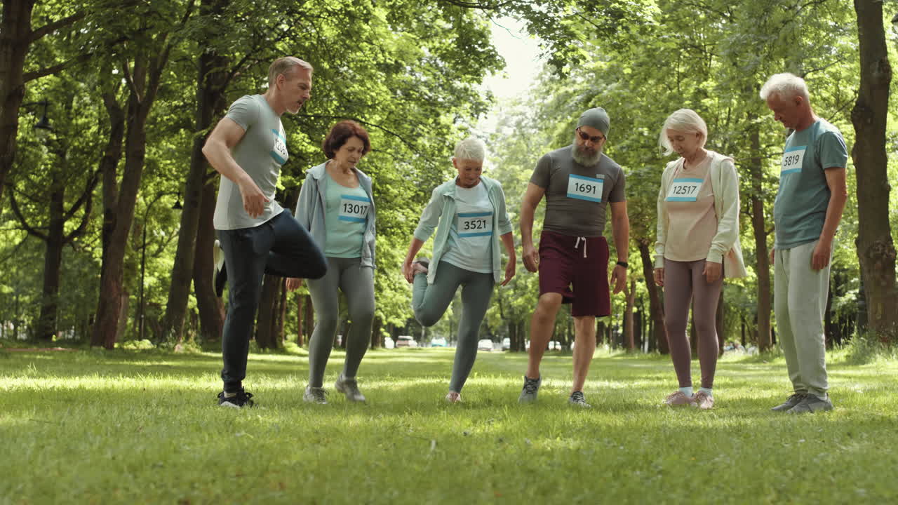 Senior Citizens Stretching in Park