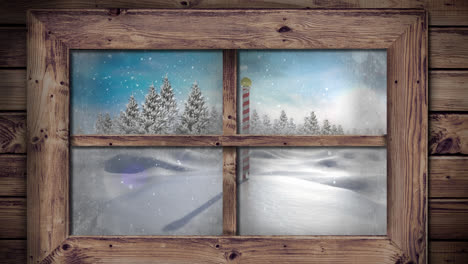 Animation of snow falling over winter scenery seen through window