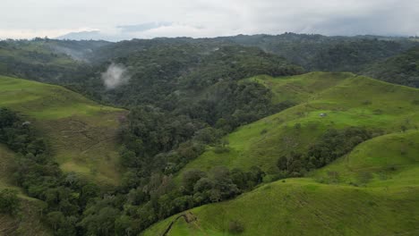 fyling over the lush mountain ridges near filandia in the quindío department of the coffee axis in colombia