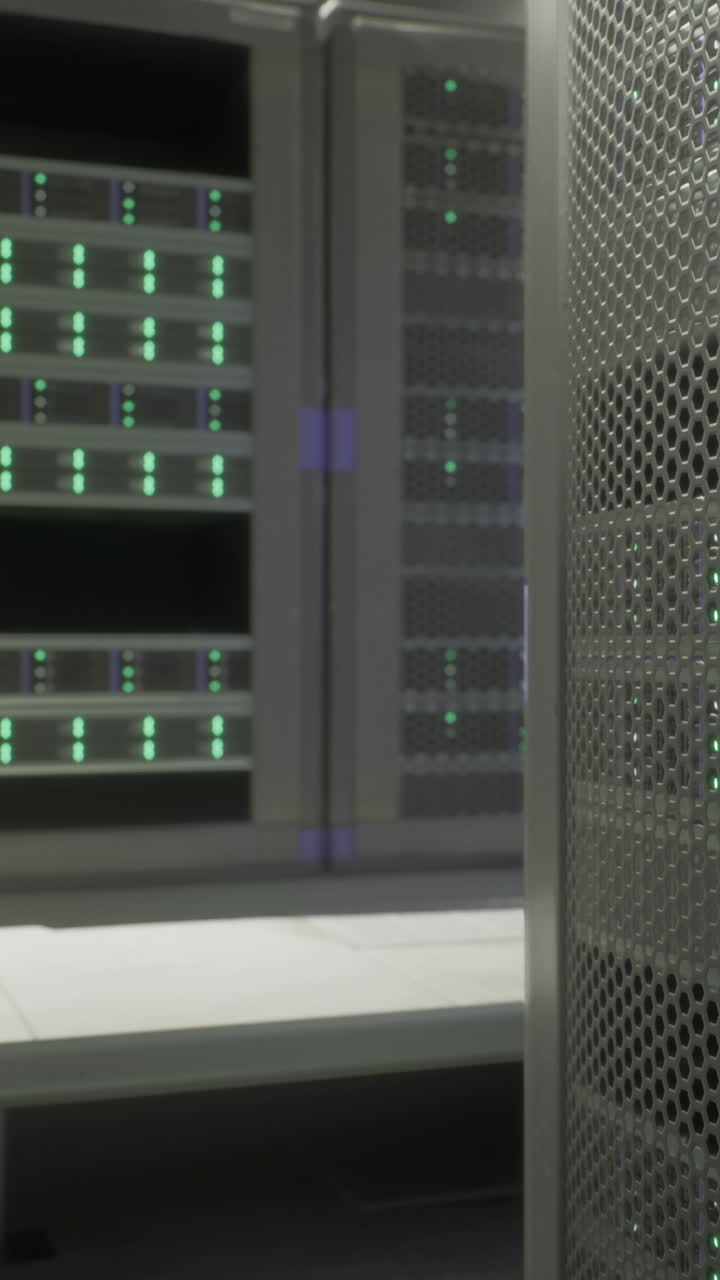 Servers operate in a data center with green lights in the evening