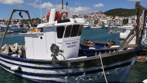 close up traditional spanish fishing boat at puerto de la duquesa in spain