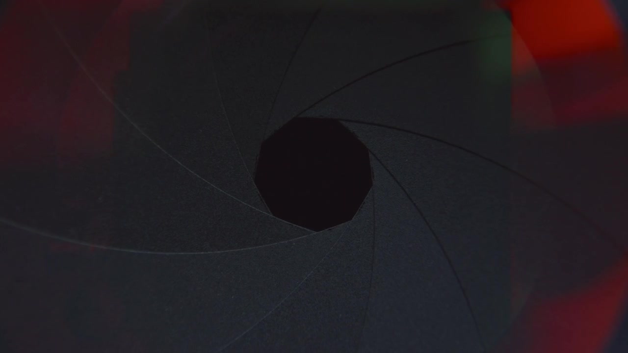 Close-Up of Camera Aperture Blades Forming Wide Opening