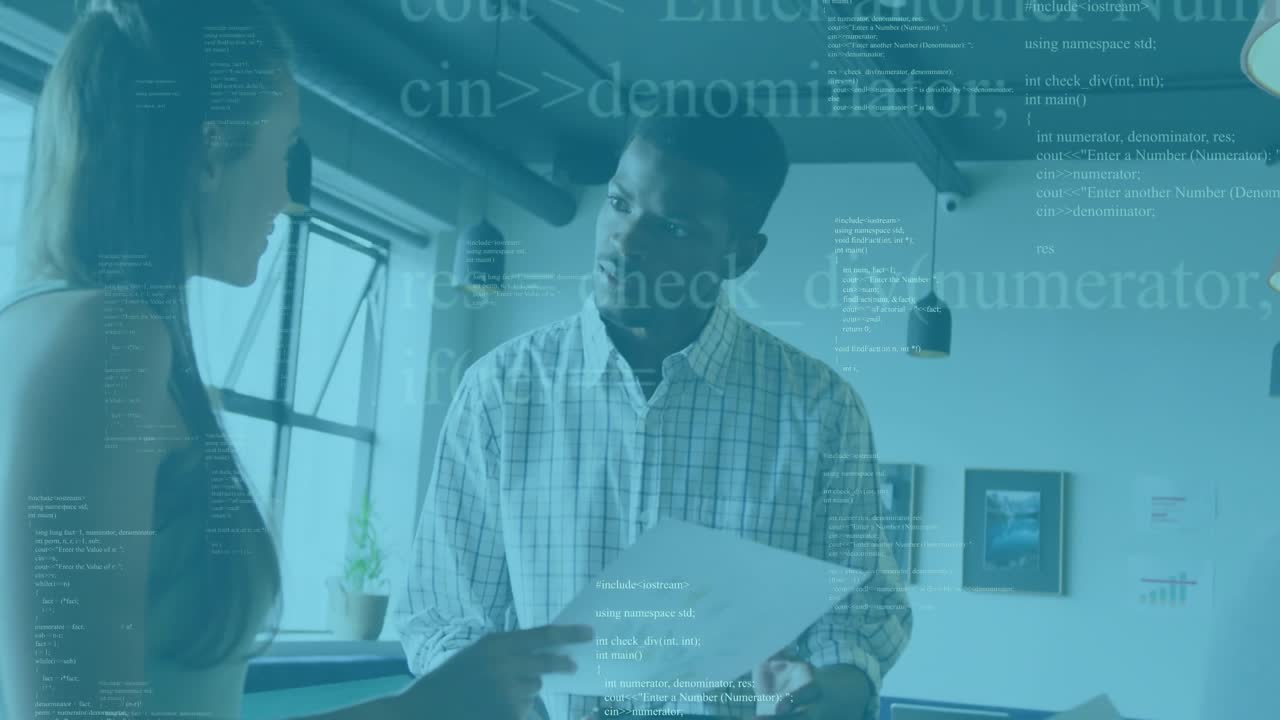 Junior developer pointing printed code in code review to prompt developer reviewing code accuracy