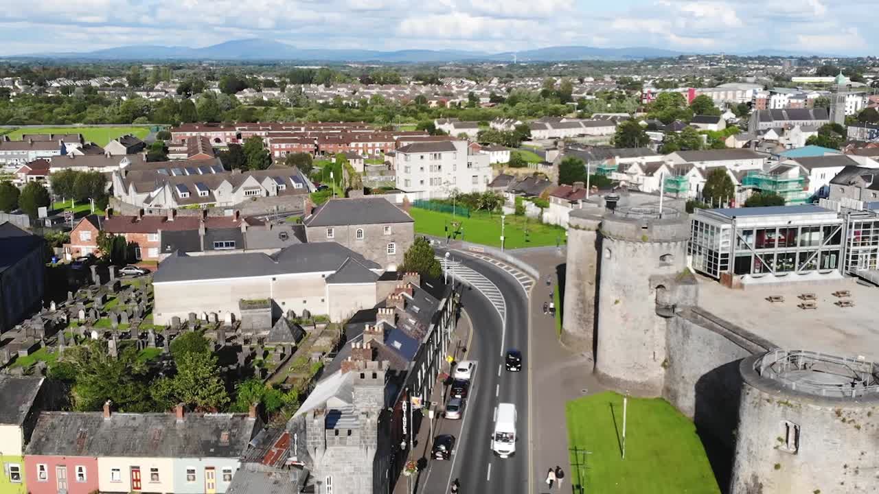 King John's Castle drone close up over the bridge and the fortress towers. Limerick, Ireland