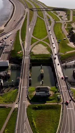 aerial view of highway and bridge over canal
