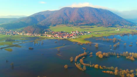 Aerial-4K-drone-footage-of-a-Planina-plain-,-Slovenia