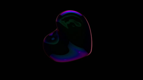 Soap-Bubble-Heart-floating-in-dark-room