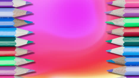 animación de iconos de lápices sobre un fondo de colores.