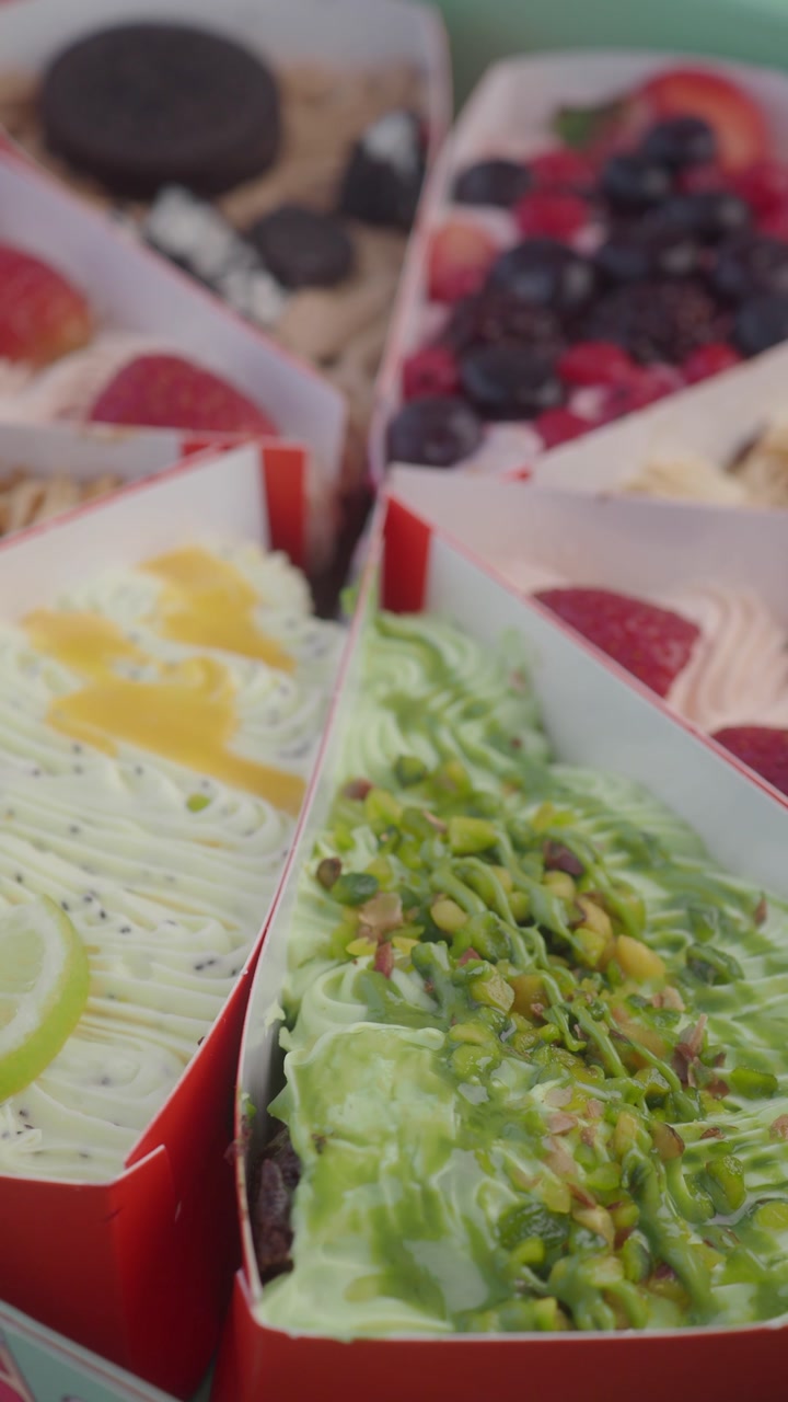 Close-up of Colorful Dessert Slices with Various Toppings