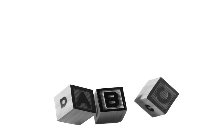 Abc spelled out in letters falling over