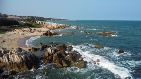 aerial backwards view over a beautiful rocky ke ga beach