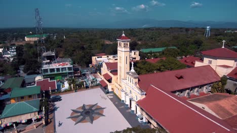 aerial drone shot of our lady of the most holy rosary of manaoag church in pangasinan