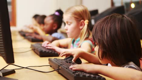 pupils in computer class at school