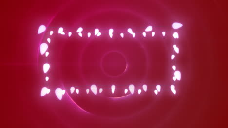 animación de luces de hadas que forman un marco rectangular con espacio de copia en círculos rosados pulsantes