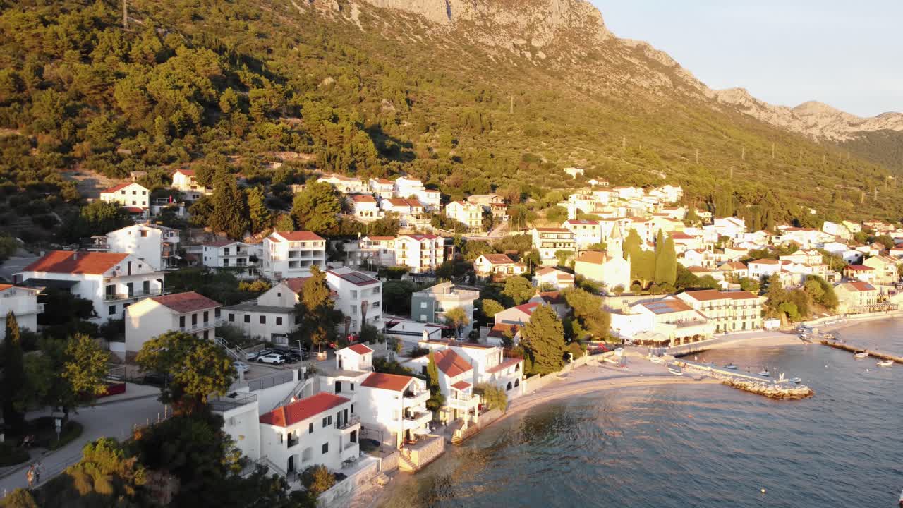 A Village Under The Mountain Biokovo In Brist, Southern Dalmatia, Croatia. Aerial Drone Shot