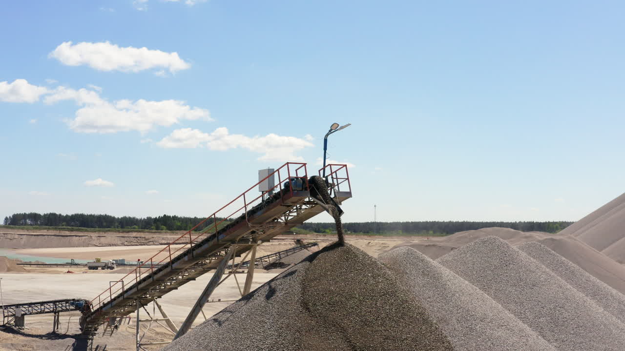Conveyor Belts Move The Gravel Into The Stockpile At Quarry Site. - aerial shot