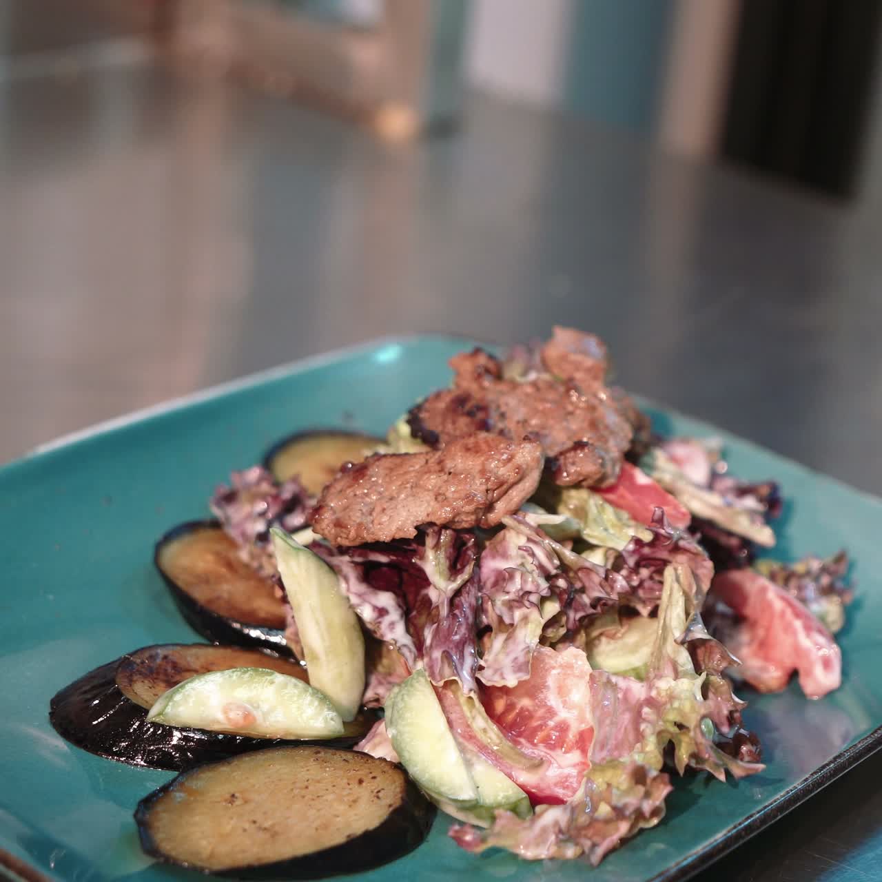 Preparing salad in restaurant