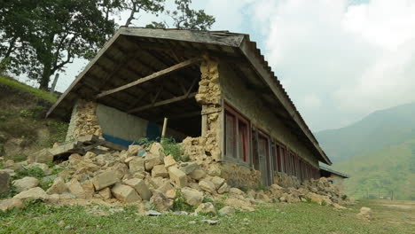 moving shot beside the exterior of a ruined home following the earthquake in nepal in april 2015