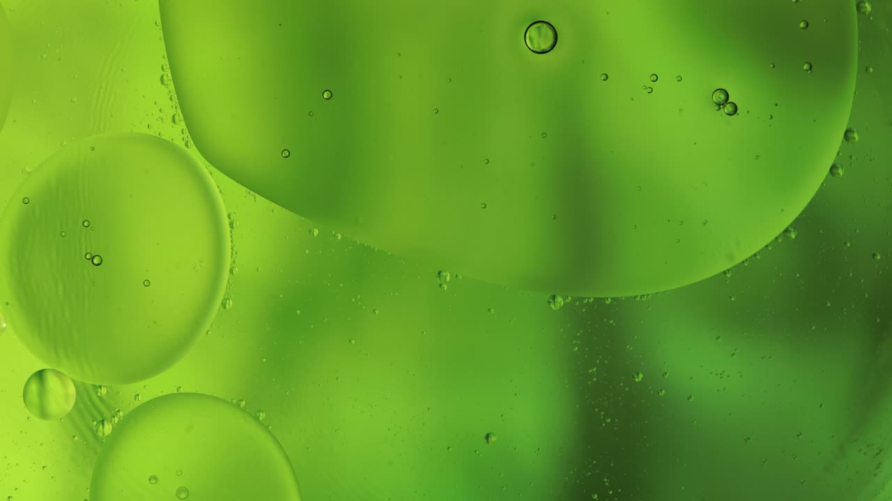 la macroestructura de las burbujas de aceite coloridas. movimiento caótico. fondo multicolor abstracto. patrón