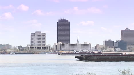 a river barge passes in baton rouge louisiana