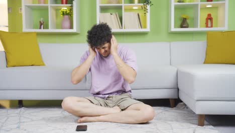 young man with brain tumor has severe headache.