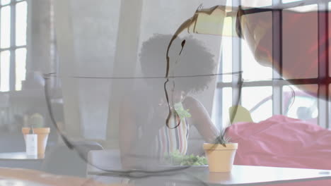 woman eating salad in café, health marketing showing pouring oil into glass bowl with plant icons