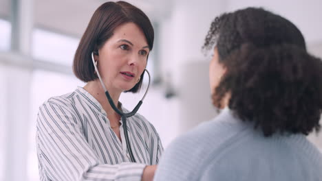 consultation, doctor and women with stethoscope