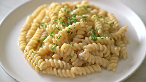 spirali-or-spiral-pasta-mushroom-cream-sauce-with-parsley---Italian-food-style