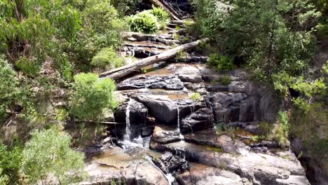 Aerial---Hidden-waterfall-deep-in-the-Australian-Bush