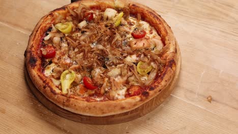 delicious seafood pizza with salmon, shrimp, and mushrooms