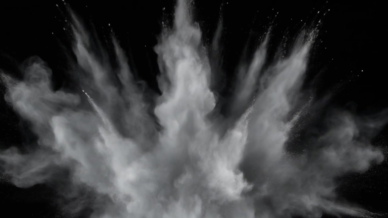 White Powder Explosion Against a Black Background