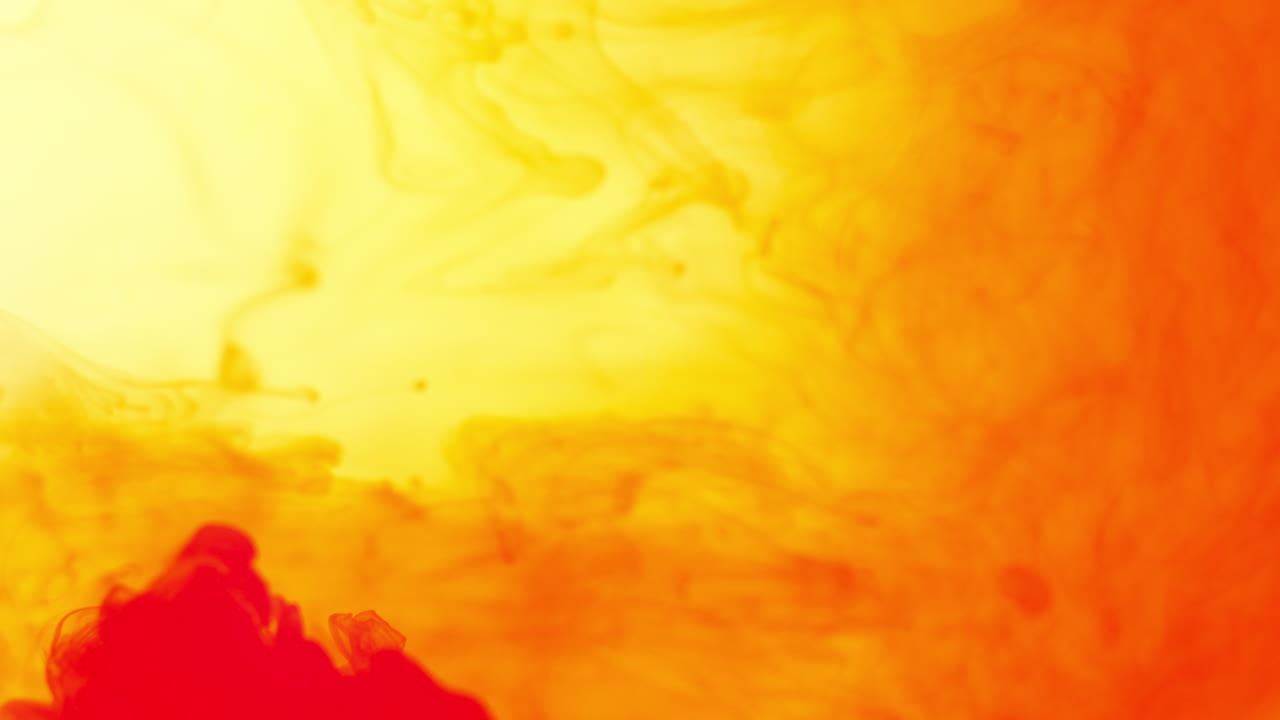 Free stock video Red and orange paint or dye dropped into water