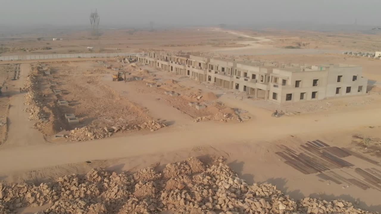 Aerial View Of Construction Development In Karachi. Dolly Forward