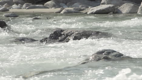 closed frame in slowmotion of the water of the venosc river in the french alps