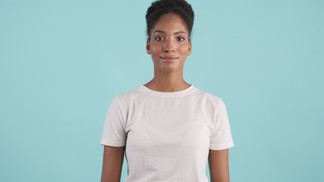 Happy woman doing sleeping gesture