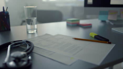 work desk doctor therapist closeup. modern workplace medicine professional.