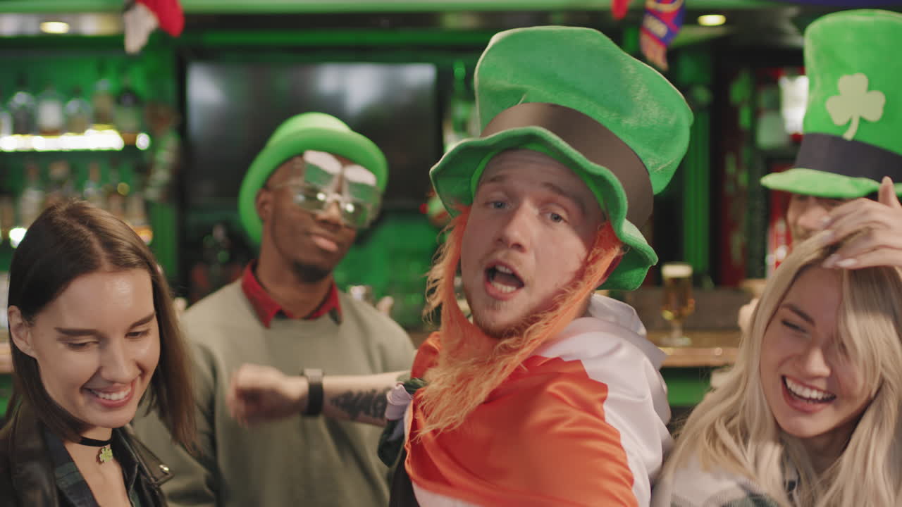 Friends Having Party In Irish Pub